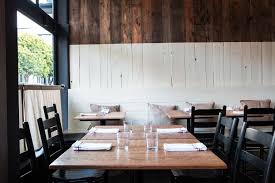 Raise High The Roofbeam Rich Table In Sf Remodelista Restaurant Interior Home Remodeling Timber Walls