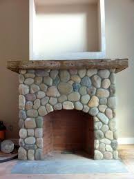 The house we are buying has this river rock fireplce that is not our style. Sapia Builders News And Events River Stone Veneer Fireplace