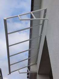 Das Vordach Hamburg Ist Ein Pultdach Aus Gepressten Aluminium Profil Es Ist Ein Modell Auf Konsolen Dessen Seiten Offe Vordach Dachkonstruktion Hausturvordach