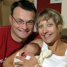 Policeman delivers baby son
