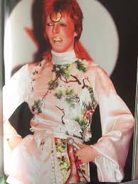 The title track to bowie's 15th album, let's dance, was produced by nile rodgers, who was responsible for the album's funky sound. Pin By Rogerina On Bowie Let S Dance Union Jack Coat Kimono Yamamoto David Bowie Costume David Bowie Fashion David Bowie