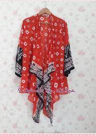 Bahan renda ditempatkan pada lapisan paling luar sebagai penghias long. Simply Outer Palembang Traditional Cloth Jumputan Gaun Gaun Renda Batik