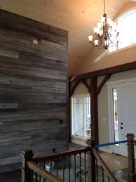 Reclaimed Barnwood Accent Wall In Entry Way Of Reclaimed Barnwood Beam Timber Frame House Built By Www Benedictbarns Com Rustic House Barn Wood House Design