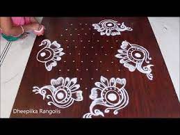 Easy And Simple Peacock Rangoli Design With 11 6 Dots Ii Flower Kolam Designs Ii Peacock Muggulu Free Hand Rangoli Design Rangoli With Dots Rangoli Patterns