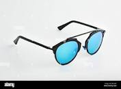 Blue tinted glasses hi-res stock photography and images - Alamy