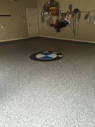 Asphalt Flake Epoxy Floor With Custom Bmw Logo Flooring Epoxy Floor Custom Bmw