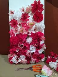 How to make fake flowers with paper. Gluing Loose Silk Flowers To Art Canvas Bottom Of The Canvas Upwards I Started Out By Applying The Flower Wall Art Diy Silk Flowers Diy Silk Flower Crafts