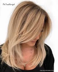 Throw in a heavy part on one side and some feathered layers that lay away from the face to give cute short hairstyles a soft sweeping style. Feathered Mid Length Style 60 Fun And Flattering Medium Hairstyles For Women Of All Ages The Trending Hairstyle