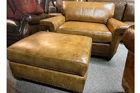 Explore artfully timeless leather living room furniture. Burnished Leather Chair And A Half With Ottoman Hat Creek Interiors