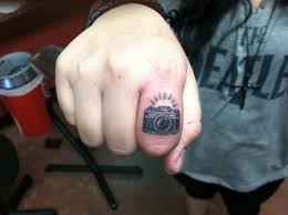 55 Cute Little Finger Tattoo Ideas To Try This Year Camera Tattoos Finger Tattoos Creative Tattoos