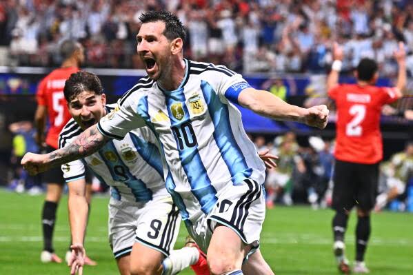 Lionel Messi celebrates a dramatic turnaround against Egypt at the 2026 World Cup., AI generated