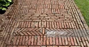 For example 4′ wide (six 8″ paver lengths) by 10′ long (fifteen 8″ paver lengths). Photo Showing An Old Block Paved Pathway With Weathered Aged Red Brick Path Brick Pathway Brick Paving