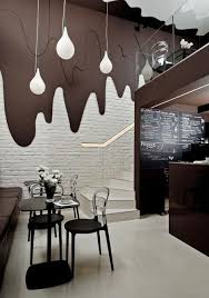 Chocolate Appears To Be Dripping Down The Walls At This Cafe In Opole Poland By Interior Desig Coffee Shops Interior Bar Interior Design Cafe Interior Design