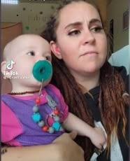 Mom's vow of silence with family til they learn sign language for her  daughter