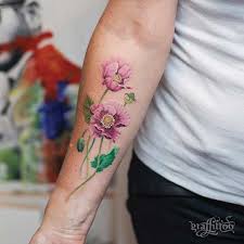 Some are more life like than others, and some artist have chosen to tattoo flowers in an abstract point of view. 47 Breathtaking Watercolor Flower Tattoos Stayglam