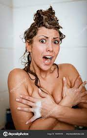 Scared Young Woman Naked Shower Cabin Clasping Her Arms Her Stock Photo by  ©MilanMarkovic 183970440
