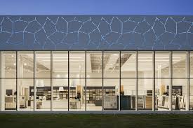 Serving bellevue, redmond, renton, kirkland and seattle wa, 98108. Custom Porcelain Facade Tiles Deliver High Style To Centura Quebec S Industrial Park Showroom Facades Premier Conference On High Performance Building Enclosures