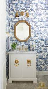 If you want to see some color, paint the walls, put up art, towels, a vase, if there's room, pretty bottles, etc. Blue Chinoiserie Powder Room With Gold Accents Asian Bathroom