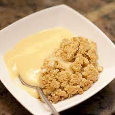 Classic Apple Crumble, the classic dessert served with custard