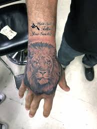 Best Black And Grey Tattoo Artists In San Diego Lion Hand Tattoo Lion Hand Tattoo Hand Tattoos Tattoos