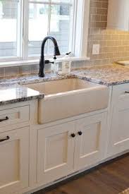 If possible open up and raise the ceiling to help the room feel bigger. Farmhouse Galley Kitchen Design Ideas Amp Remodel Pictures Houzz Galley Kitchen Design Kitchen Remodel Layout Farmhouse Kitchen Remodel