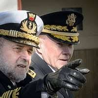 Captain Raymond A. Sharpe Jr., USN (covered)