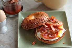 Toss lettuces to combine, then top with cucumbers, cherry tomatoes, avocado, red onions, cooked eggs, and smoked salmon as shown. Smoked Salmon Breakfast Bagel Country Cleaver