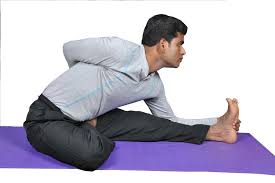 Ardha Baddha Padma Paschimottanasana Half Bound Lotus Forward Bend Karuna Yoga Best Yoga Teacher Training Course Bangalore India