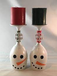 These cheery wine glass candle holders will look fantastic on your christmas table. Snowman Wine Glass Pillar Candle Holder Set Of 2 Includes Candles Free Shipping Christmas Wine Glasses Diy Wine Glass Crafts Christmas Wine Glasses