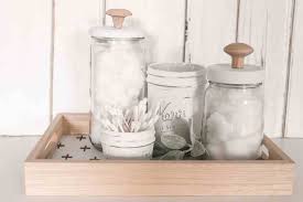 Glass, glass jar, permanent glass paint, mason jar lid, wire hanger. Easy Diy Upcycled Glass Jars For Bathroom Storage Her Happy Home