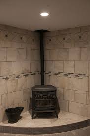 Most basements won't have the capacity for a full kitchen, which is often why landlords put in a kitchenette instead. Basement Finish In Wichita Ks Pellet Stove With Custom Tile Surround Pinnacle Homes Inc