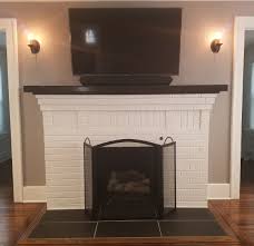 Black And White Fireplace Hearth Tiles Heating Things Up Black Tiles Fireplace Black Floor Tiles