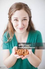 403 Hand Full Of Nuts Stock Photos, High-Res Pictures, and Images