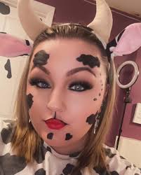 Smelly was an excellent moodel for her cow Halloween costume.