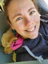 Kaylee enjoying the wet grass at the park