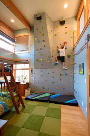 Very funny and cute kids climbing walls like spiderman. 10 Modern Houses With Rock Climbing Walls Boys Room Decor Kids Room Design Playroom Design