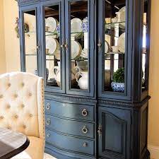 This china cabinet is perfect for displaying your favorite dishware and books in the living room or den. Annie Sloan Napoleonic Blue With Dark Wax Keller Furniture China Cabinet Antique China Cabinets Refurbished Furniture Redo Furniture