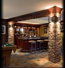 Interiors With Wood And Stone Columns Google Search Bringing Exterior Materials Inside To Match Brick Columns Brick Interior Interior Columns