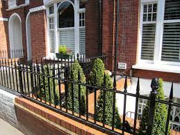 Traditional yellow stock brick walls with york stone coping drills wrought iron metal rail and gate bullnose sawn stone steps bespoke storage victorian restoration work islington. Metal Garden Railings In London Surrey Smart Steels