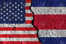 Two blue bands are featured on the top and the bottom, followed by two white bands of the same direction and proportion. Crack Between America And Costa Rica Flags Political Relationship Stock Photo Picture And Royalty Free Image Image 92675404