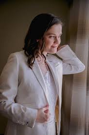 These queer brides celebrated their summer wedding with a new combined last  name and a reading from a landmark marriage equality case