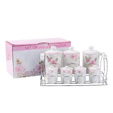 Three white ceramic canisters set in scrollwork holders give a touch of elegance to your kitchen. Oem Color Box Package Rose Floral Printed Tea Coffee Sugar Fine Porcelain 7 Pcs Canisters Sets For The Kitchen Buy Candy Ceramic Jar Pink Red Canister Sets For Kitchen Unique Kitchen Canisters Set