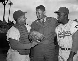 A large wall covered in a jackie robinson when he played for the kanas city monarchs graffiti in the historic art area. Remembering Jackie Robinson S Passion The New York Times