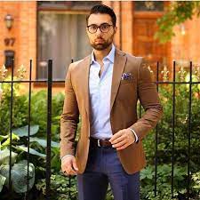 When worn with a classic white shirt and tie and paired with dress pants, you'll have a winning combo that will never go out of style. Men S Tan Blazer Light Blue Long Sleeve Shirt Navy Dress Pants Violet Print Pocket Square Tan Blazer Outfits Mens Fashion Blazer Navy Dress Pants