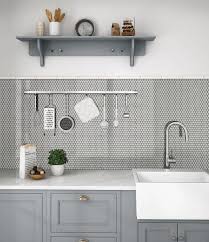 Penny tiles are mostly used for backsplashes because this is great way to highlight your décor. White Penny Tile Kitchen Novocom Top