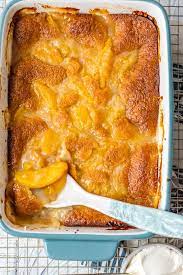 Don't drain all the juice in the can because it moistens the cake mix when baking. Easy Peach Cobbler Recipe Made With Canned Peaches Video