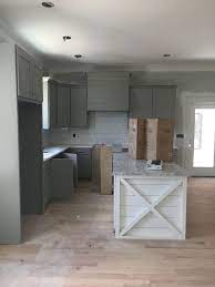 Grey cabinet with white countertop bathrooms with shiplap backsplash. Gray Kitchen Cabinets White Shiplap Island Modern Farmhouse Kitchen Square Backsplash Grey Kitchen Cabinets Grey Kitchen Walls Kitchen Cabinet Design