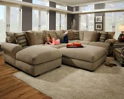 Spacious sectional sofa on chrome feet, with additional lumbar cushions, recliners and cup holders. Microfiber Sectional Sofa With Ottoman Ideas On Foter