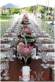 A True South African Wedding In A Bedouin Tent Traditional Wedding Decor Protea Wedding Protea Centerpiece