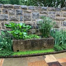 Cotswold stone troughs with running water. Howard Design Studio On Instagram Garden Details Make All The Difference An Antique Cotswold Ston Water Features In The Garden Water Features Garden Troughs